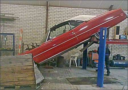 Front bumper on the floor and the rear wheels two meters up in the air
